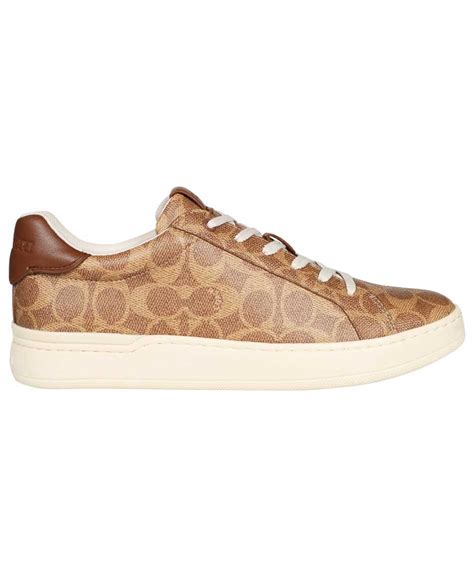 coach signature coated canvas sneakers.